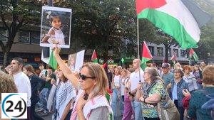 Multitudes en Bilbao rallyan a favor de la ayuda humanitaria a Gaza y en contra de la violencia.